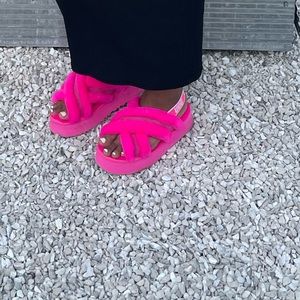 Pink Ugg slides
